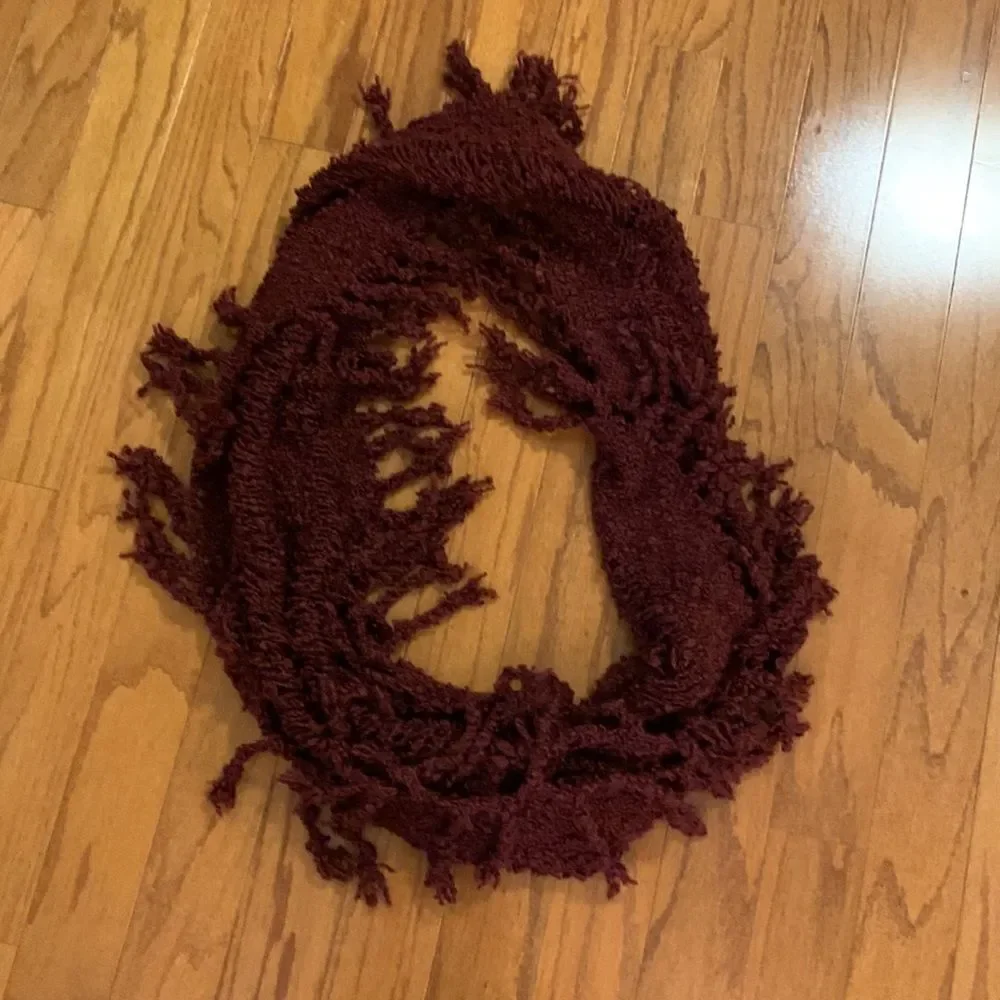 Infinity scarf burgundy in color. Very warm cozy and stylish